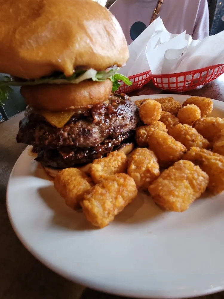 A J 'S Signature Burger with Tots